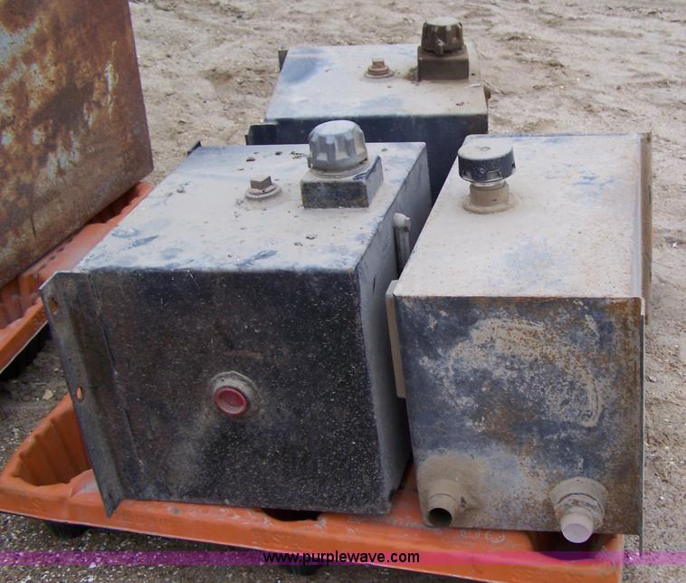 image for item 7356 (3) metal oil reservoir tanks