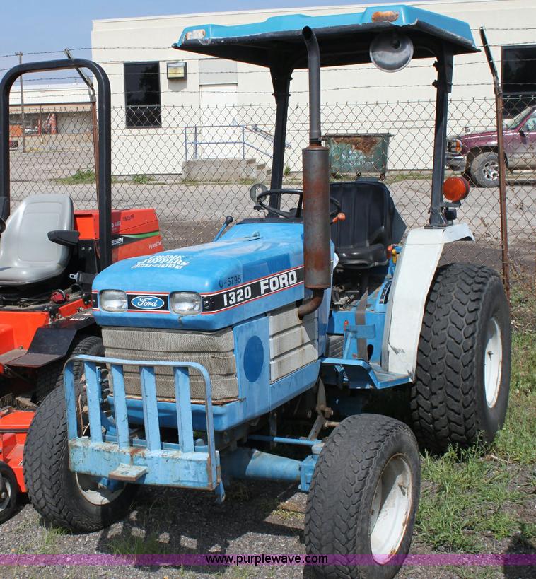 image for item 6237 Ford 1320 tractor