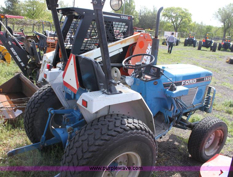 image for item 6237 Ford 1320 tractor