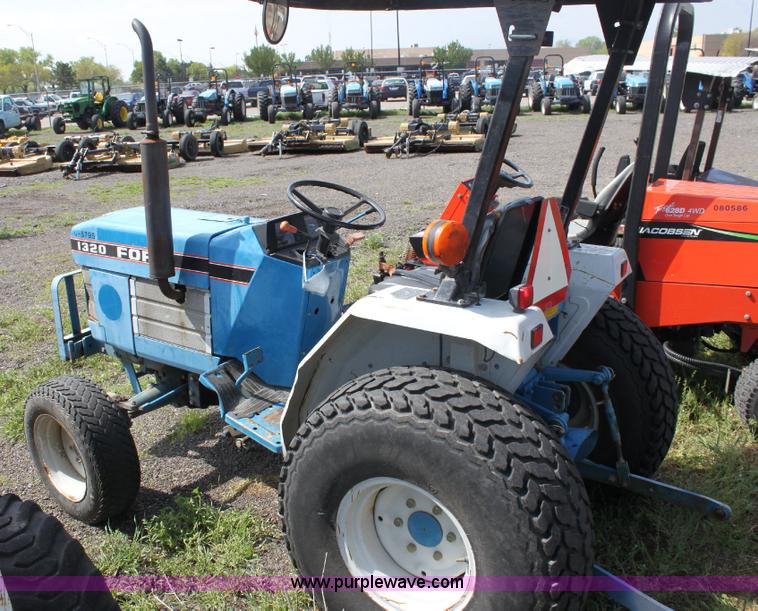 image for item 6237 Ford 1320 tractor