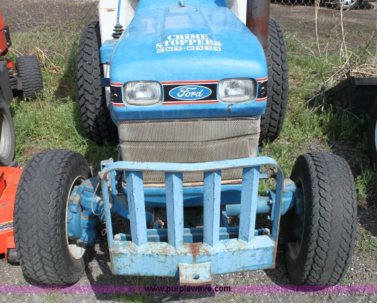 image for item 6237 Ford 1320 tractor