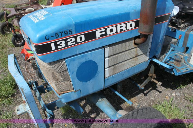 image for item 6237 Ford 1320 tractor