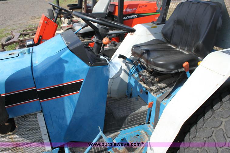 image for item 6237 Ford 1320 tractor