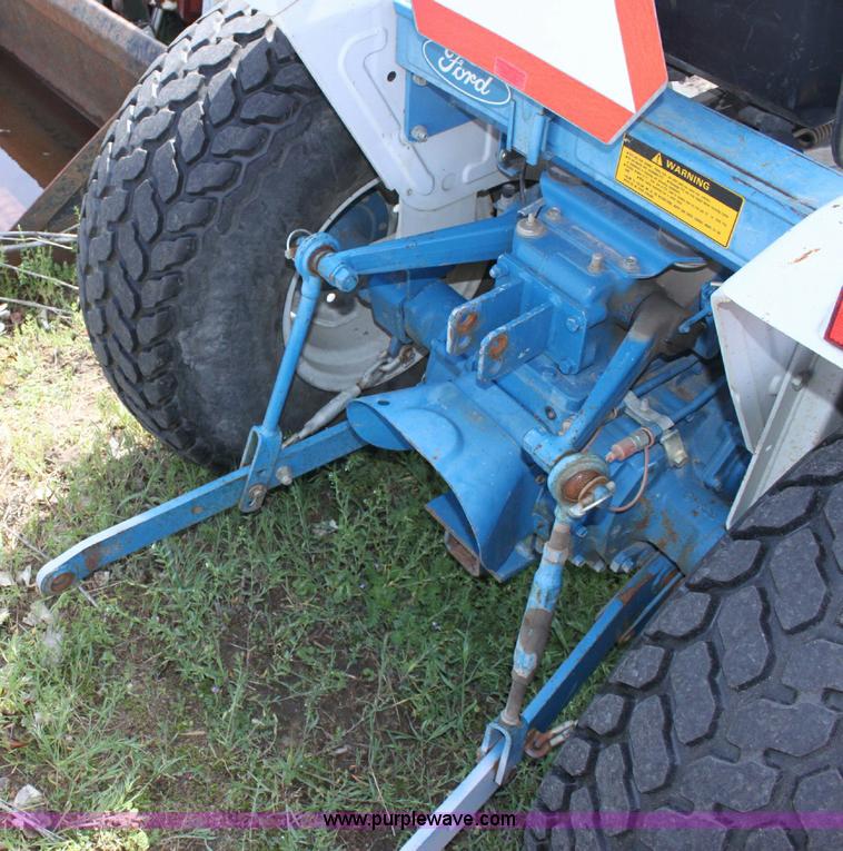 image for item 6237 Ford 1320 tractor