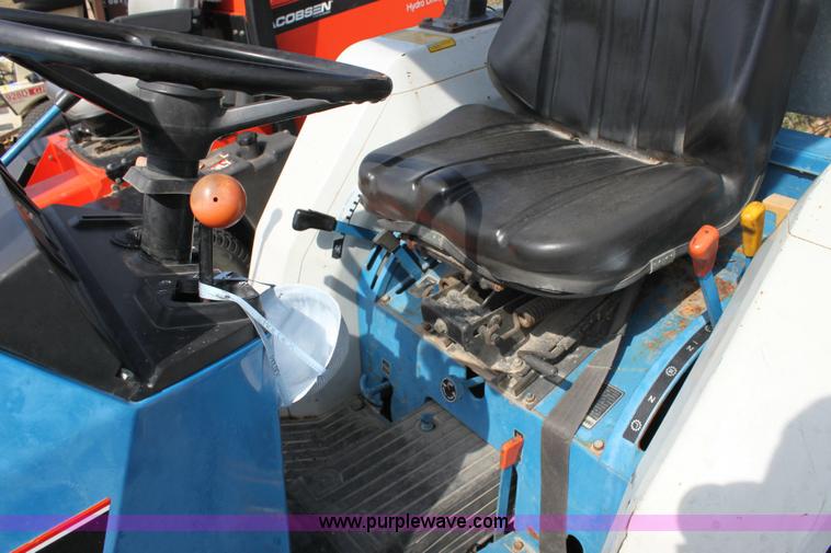 image for item 6237 Ford 1320 tractor