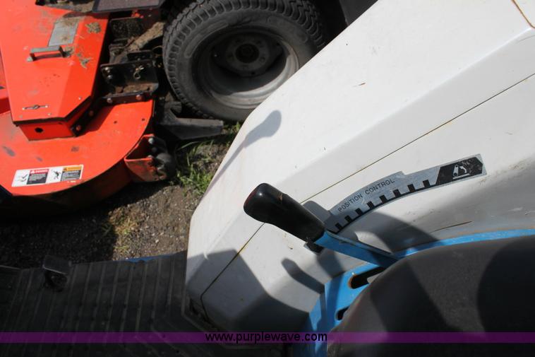 image for item 6237 Ford 1320 tractor