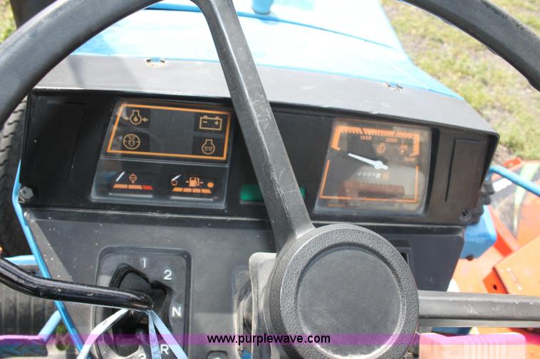 image for item 6237 Ford 1320 tractor