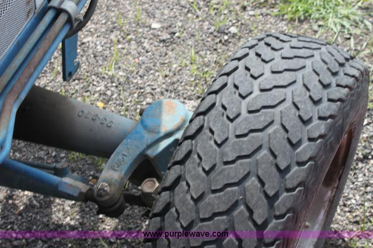 image for item 6237 Ford 1320 tractor