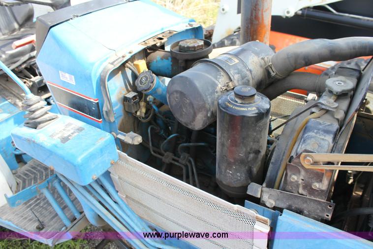 image for item 6237 Ford 1320 tractor