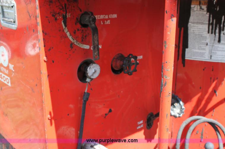 image for item 6385 2006 Crafco E-Z Pour 400D melter applicator