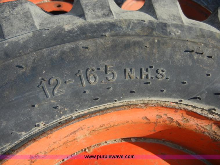 image for item 2038 (2) used skid steer tires