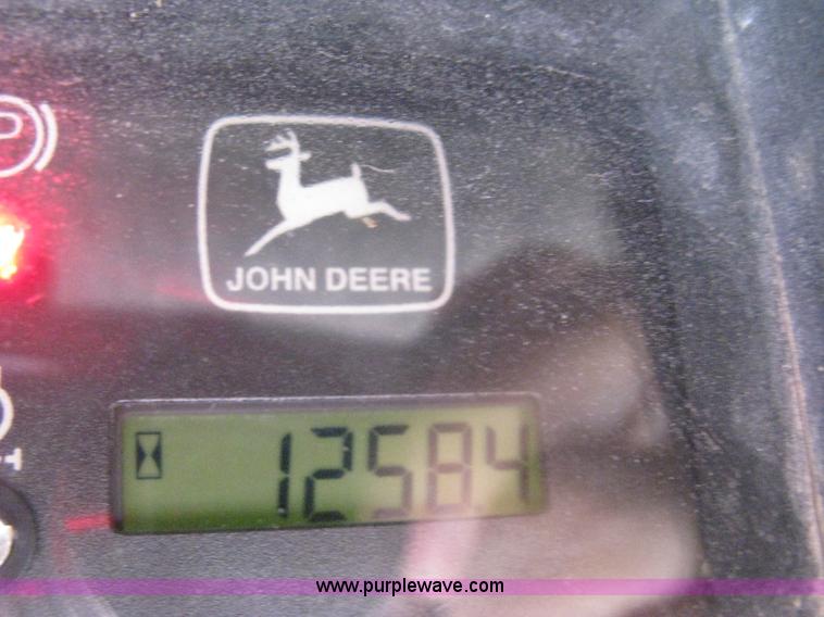 image for item 8007 John Deere 240 skid loader