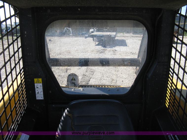 image for item 8007 John Deere 240 skid loader