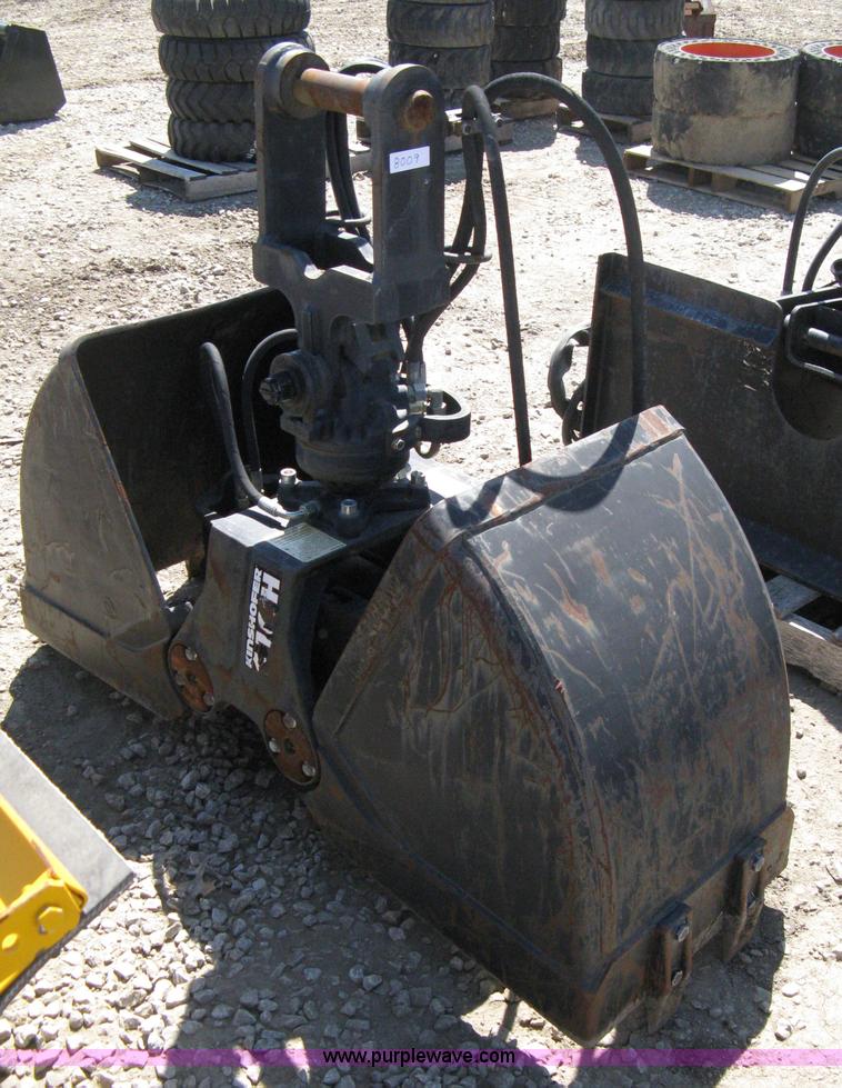 Kinshofer C10H rotating grapple with clamshell bucket in Olathe, KS