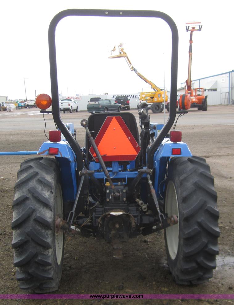 2004 New Holland TC30 MFWD tractor with loader in Garden City, KS Item 2990 sold Purple Wave