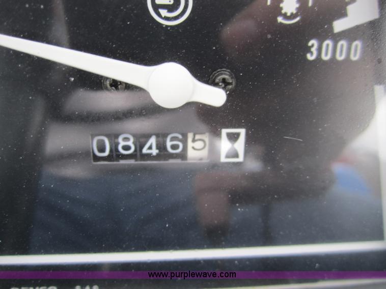 image for item 2990 2004 New Holland TC30 MFWD tractor with loader