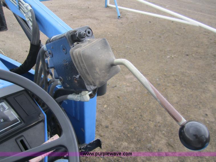 image for item 2990 2004 New Holland TC30 MFWD tractor with loader