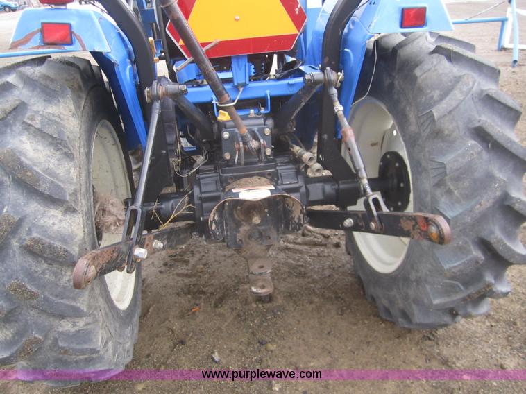 image for item 2990 2004 New Holland TC30 MFWD tractor with loader