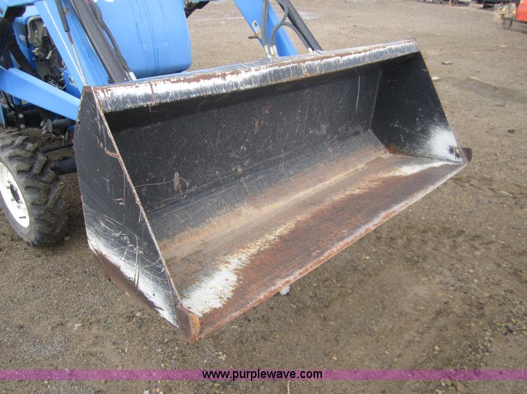 image for item 2990 2004 New Holland TC30 MFWD tractor with loader