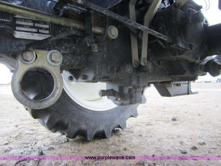 image for item 2990 2004 New Holland TC30 MFWD tractor with loader