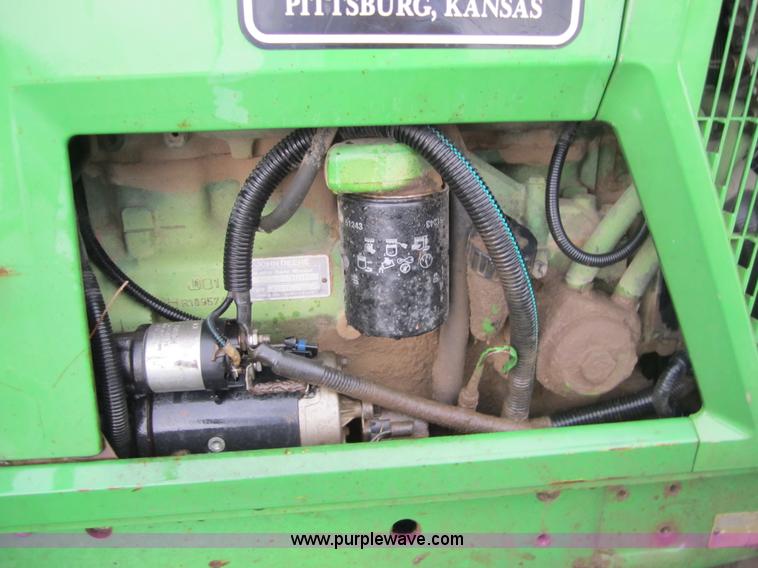 image for item 4387 1993 John Deere 6200 MFWD tractor