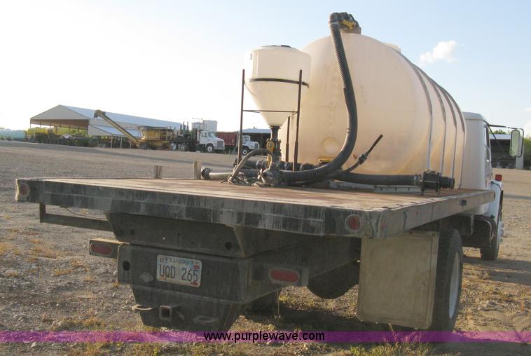 image for item 8060 1987 International S1955 flatbed tender truck