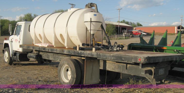 image for item 8060 1987 International S1955 flatbed tender truck