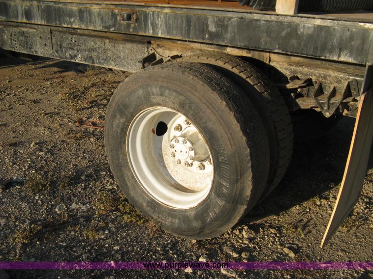 image for item 8060 1987 International S1955 flatbed tender truck