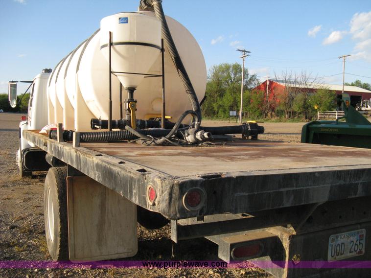 image for item 8060 1987 International S1955 flatbed tender truck