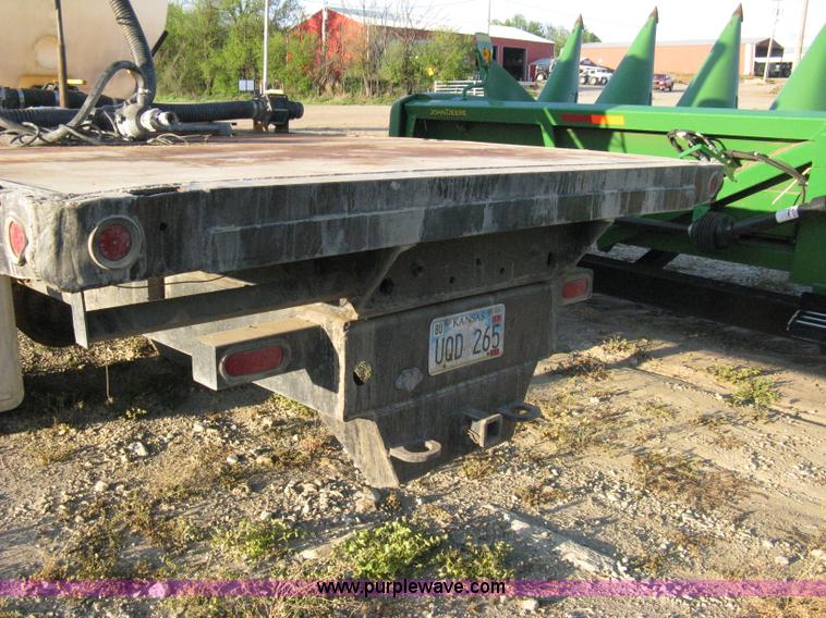 image for item 8060 1987 International S1955 flatbed tender truck