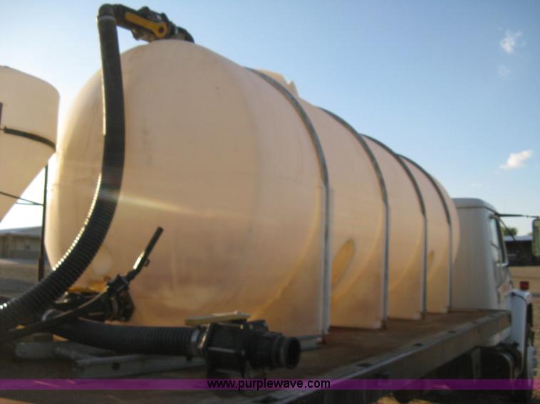 image for item 8060 1987 International S1955 flatbed tender truck