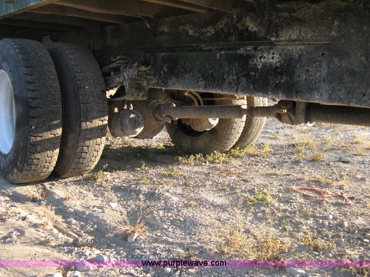 image for item 8060 1987 International S1955 flatbed tender truck