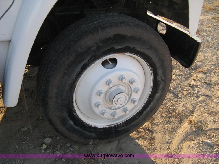 image for item 8060 1987 International S1955 flatbed tender truck