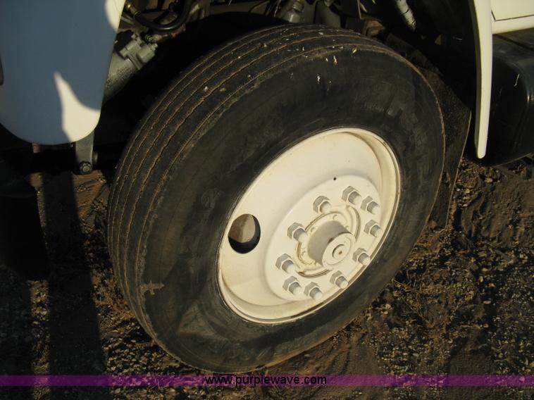 image for item 8060 1987 International S1955 flatbed tender truck