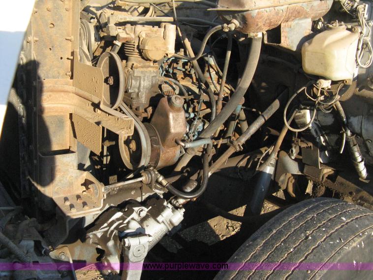 image for item 8060 1987 International S1955 flatbed tender truck