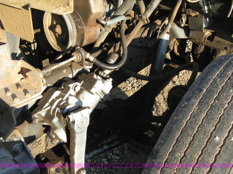 image for item 8060 1987 International S1955 flatbed tender truck