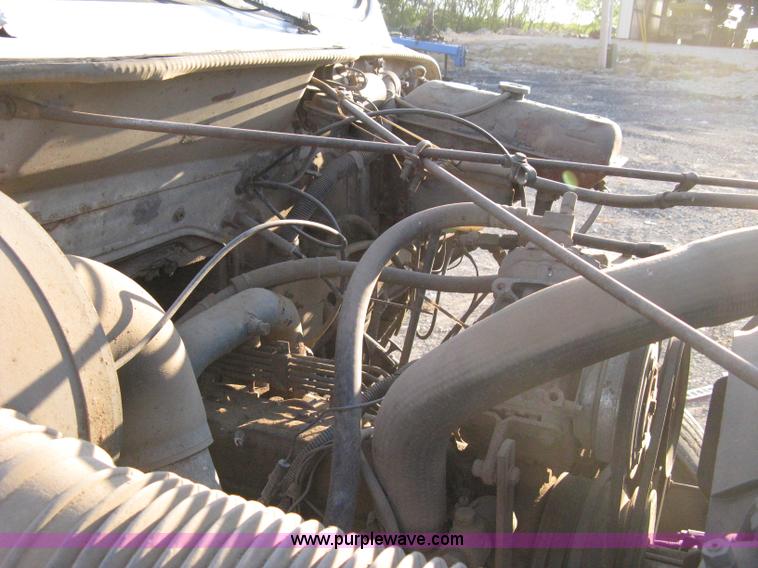 image for item 8060 1987 International S1955 flatbed tender truck