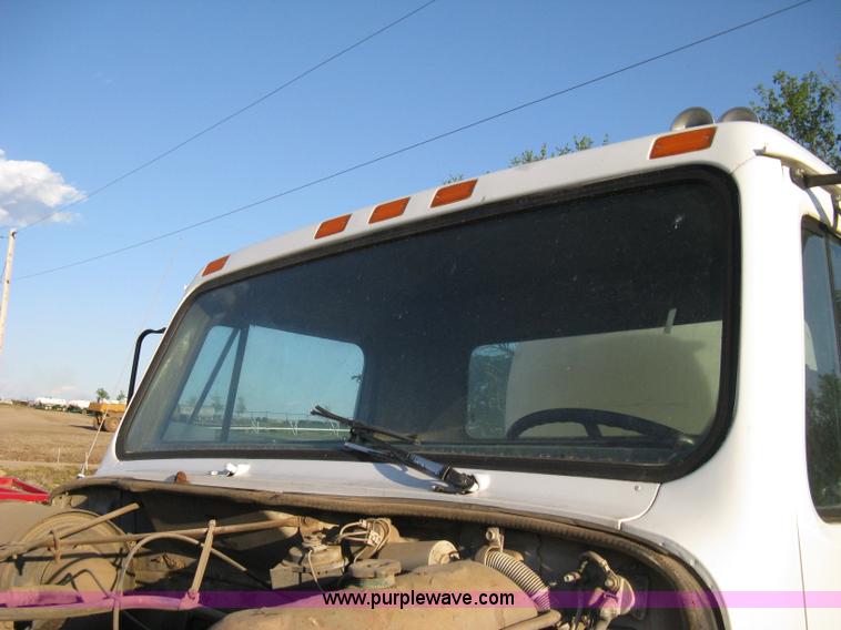 image for item 8060 1987 International S1955 flatbed tender truck