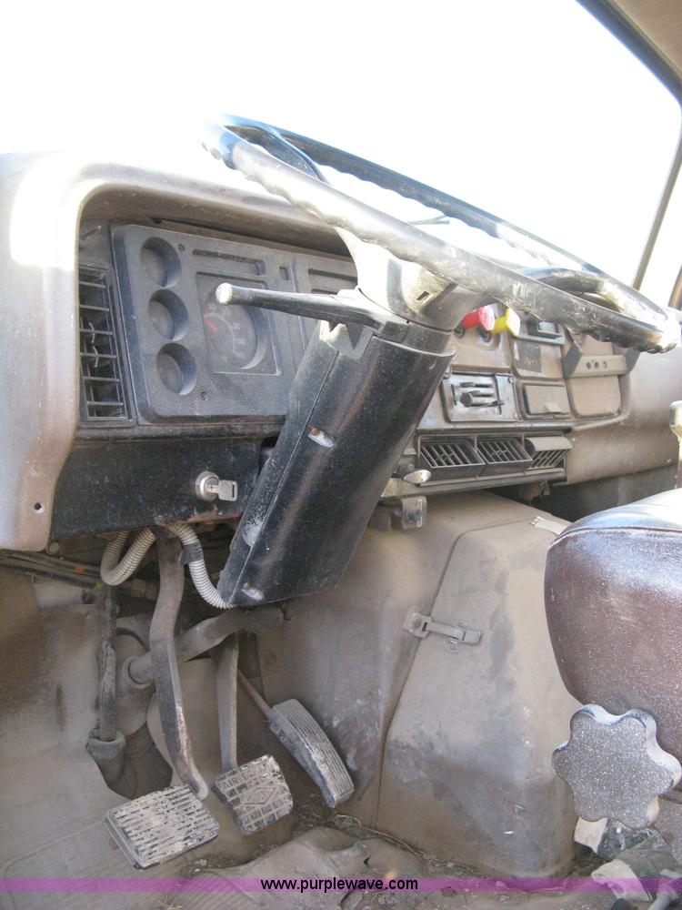 image for item 8060 1987 International S1955 flatbed tender truck