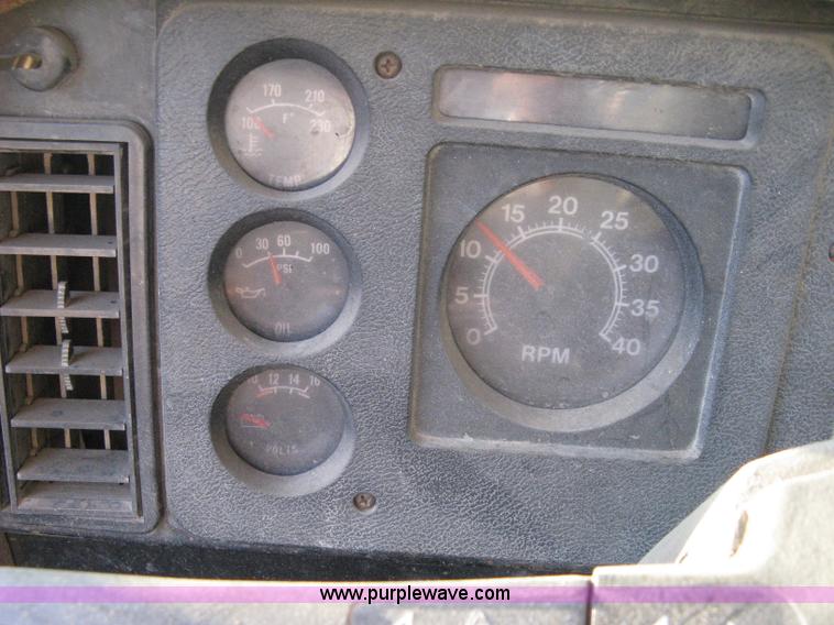 image for item 8060 1987 International S1955 flatbed tender truck