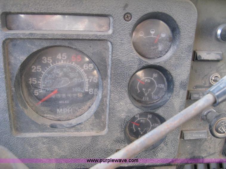 image for item 8060 1987 International S1955 flatbed tender truck