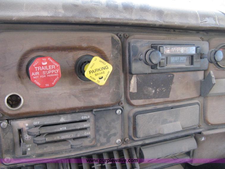 image for item 8060 1987 International S1955 flatbed tender truck