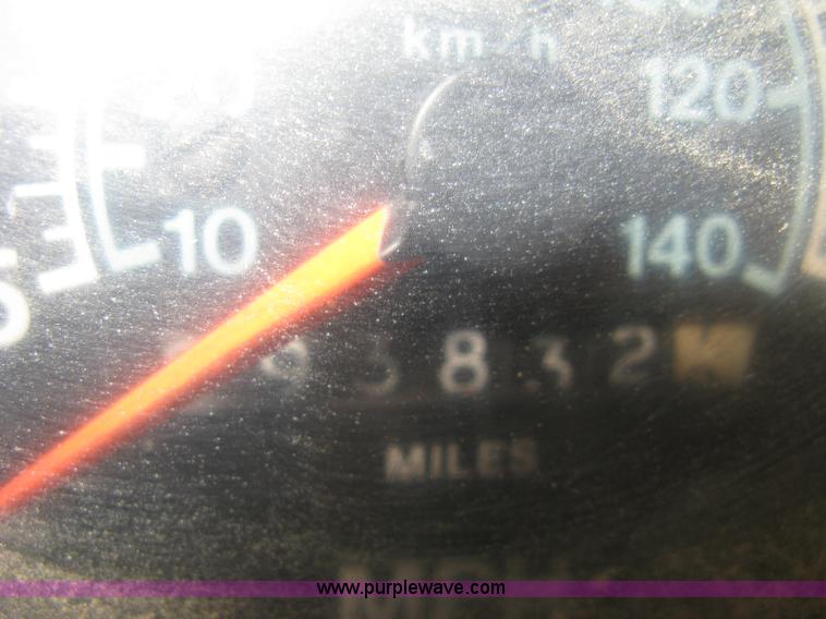 image for item 8060 1987 International S1955 flatbed tender truck