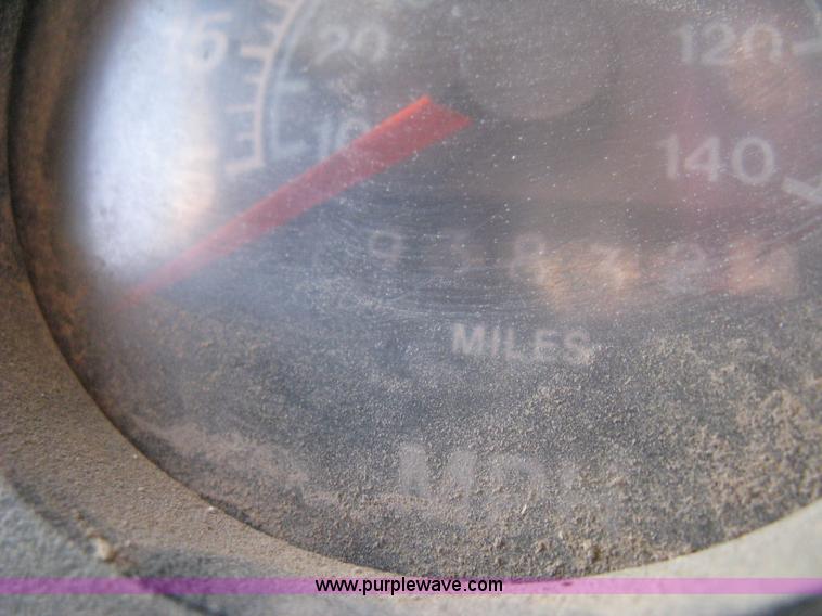 image for item 8060 1987 International S1955 flatbed tender truck