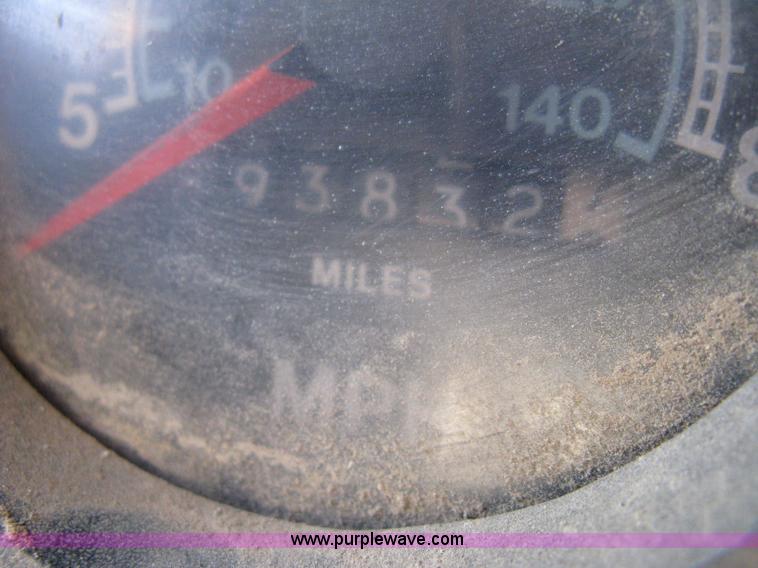 image for item 8060 1987 International S1955 flatbed tender truck