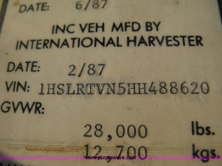 image for item 8060 1987 International S1955 flatbed tender truck