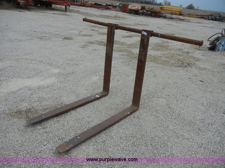 Backhoe forks in Topeka, KS Item 2387 sold Purple Wave
