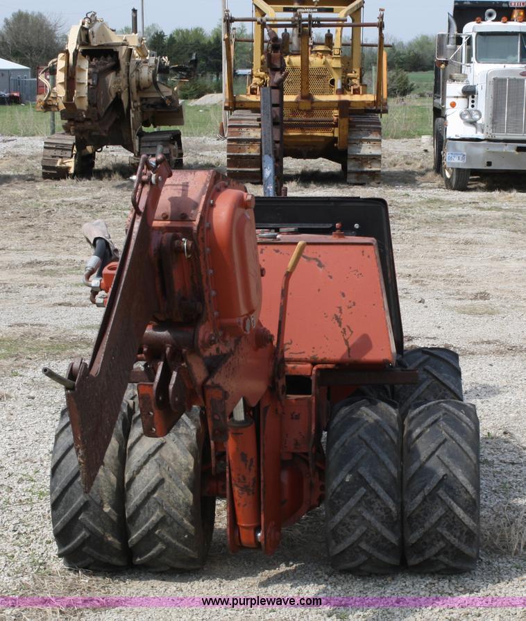 image for item 4899 1996 Ditch Witch 400SX trencher and cable plow