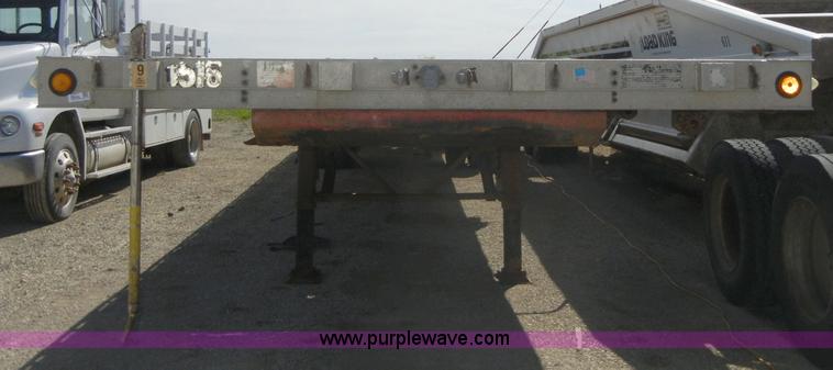 image for item 2217 1997 Talbert 48' flat bed semi trailer