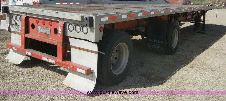 image for item 2217 1997 Talbert 48' flat bed semi trailer